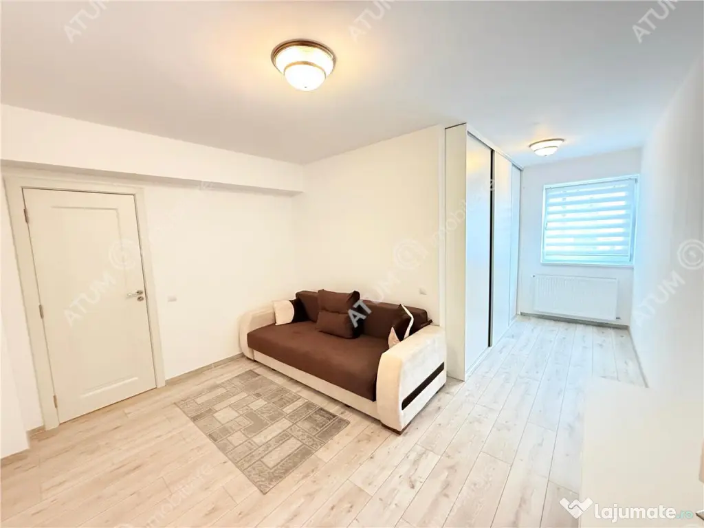 Apartament cu 2 camere 56 mp utili mobilat etaj 1 si loc de 