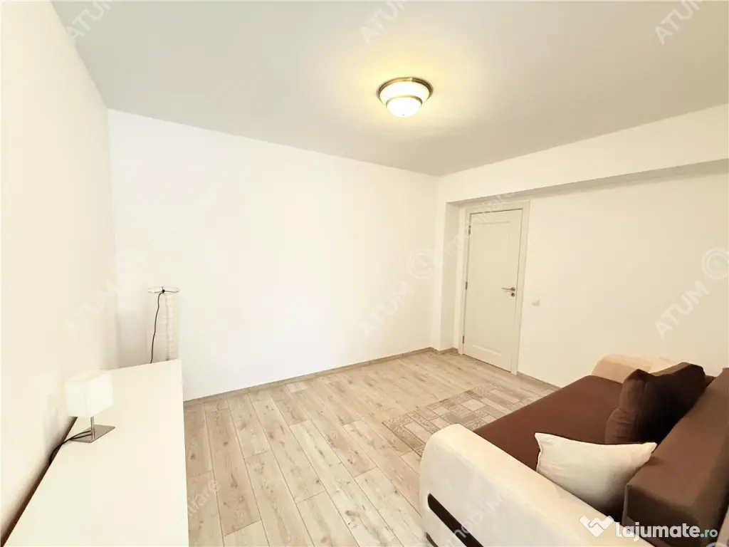 Apartament cu 2 camere 56 mp utili mobilat etaj 1 si loc de 