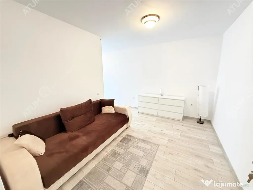 Apartament cu 2 camere 56 mp utili mobilat etaj 1 si loc de 