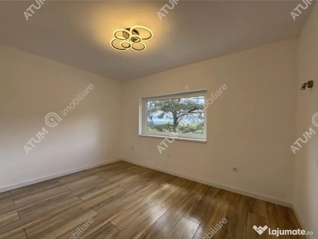 Garsoniera 36 mp cu balcon si parcare finisata la alb zona T 