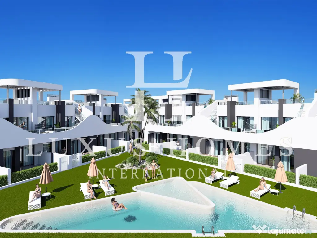 Apartament la parter, cu terasă și piscină comunitară situată aproape de coastă 