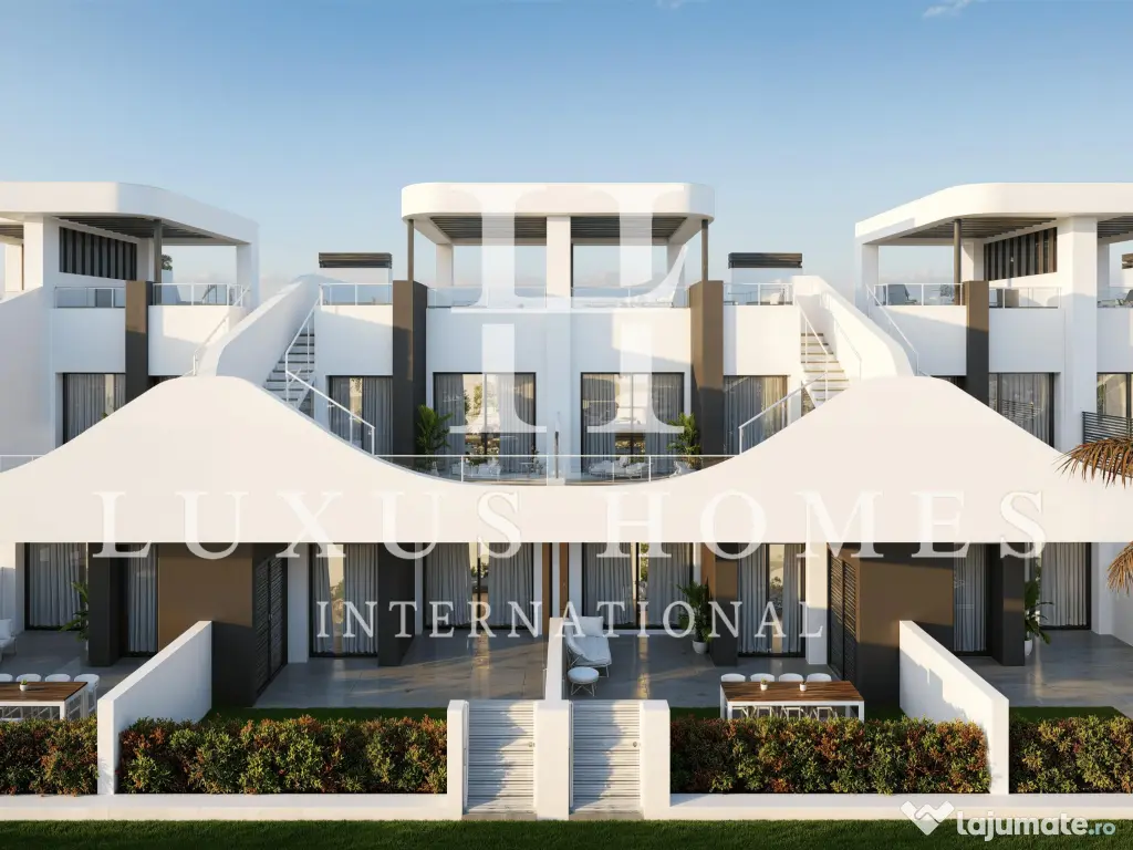 Apartament la parter, cu terasă și piscină comunitară situată aproape de coastă 