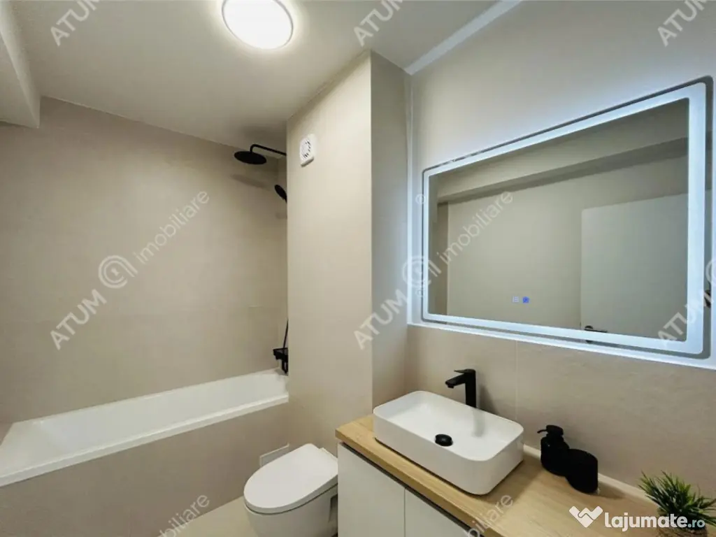 Apartament cu 3 camere 2 bai loc privat de parcare 72mp util