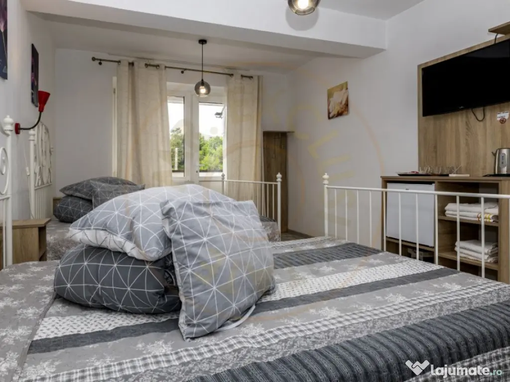 Motel, camping, piscina si lacuri de pescuit pe un teren de 