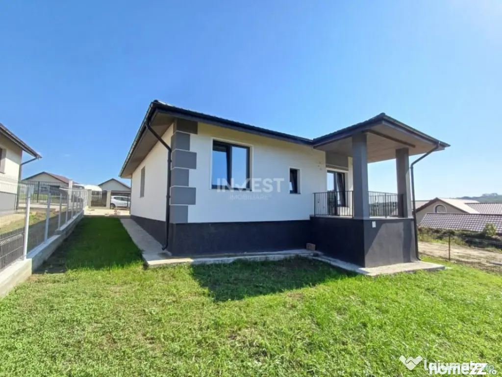 Casă cu 4 camere, 2 băi, beci spațios și 400 mp teren