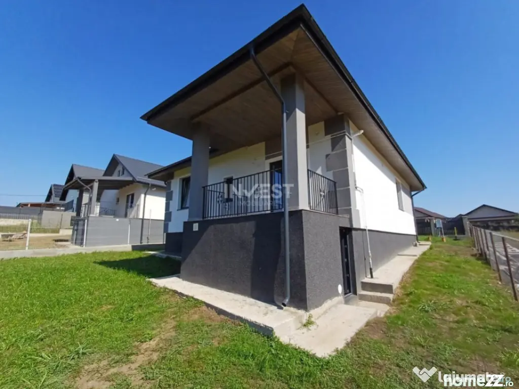 Casă cu 4 camere, 2 băi, beci spațios și 400 mp teren