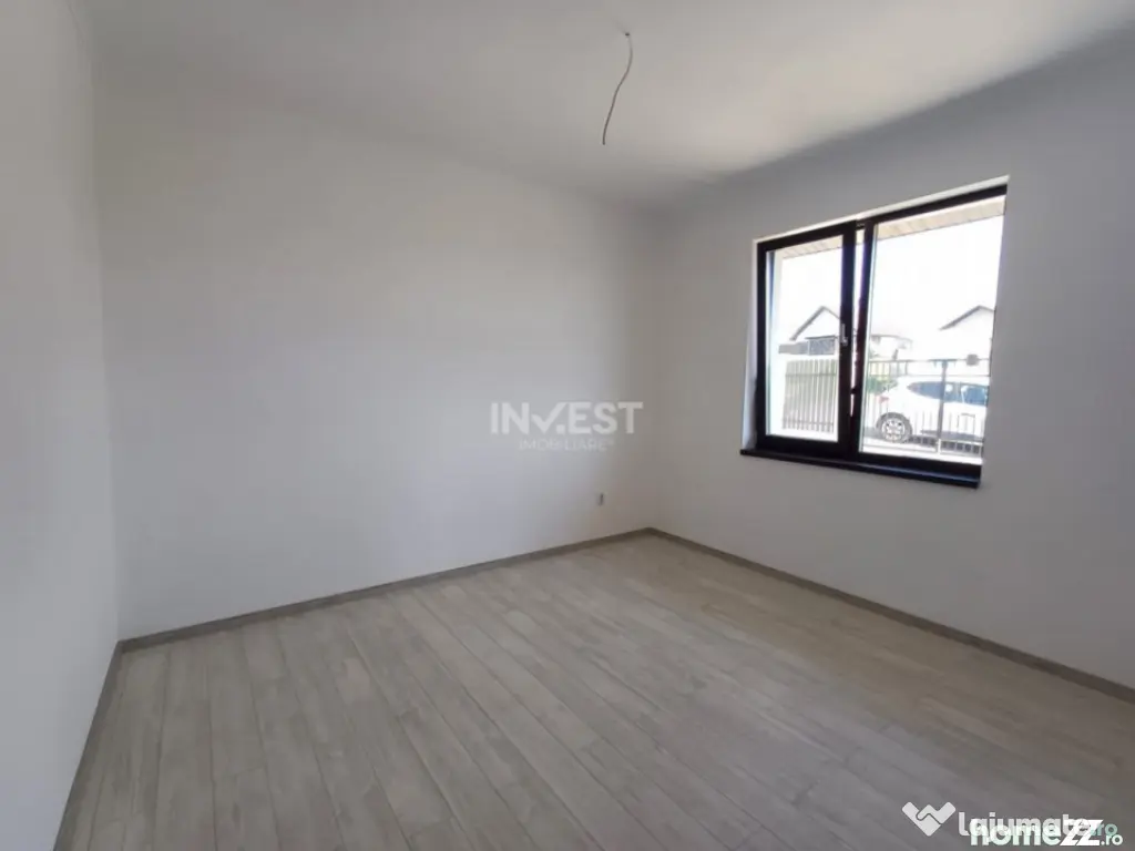 Casă cu 4 camere, 2 băi, beci spațios și 400 mp teren