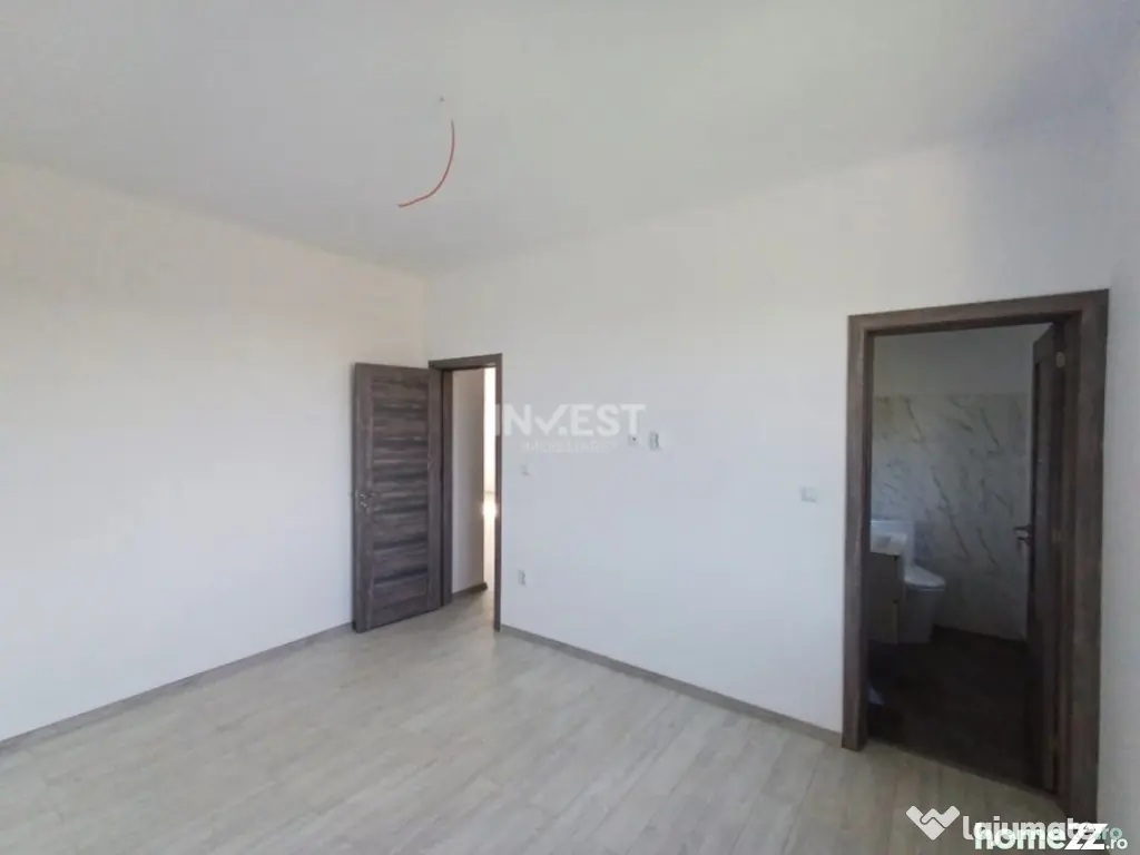 Casă cu 4 camere, 2 băi, beci spațios și 400 mp teren