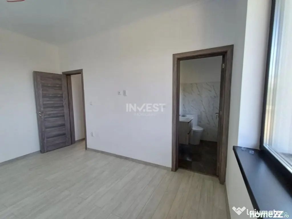 Casă cu 4 camere, 2 băi, beci spațios și 400 mp teren