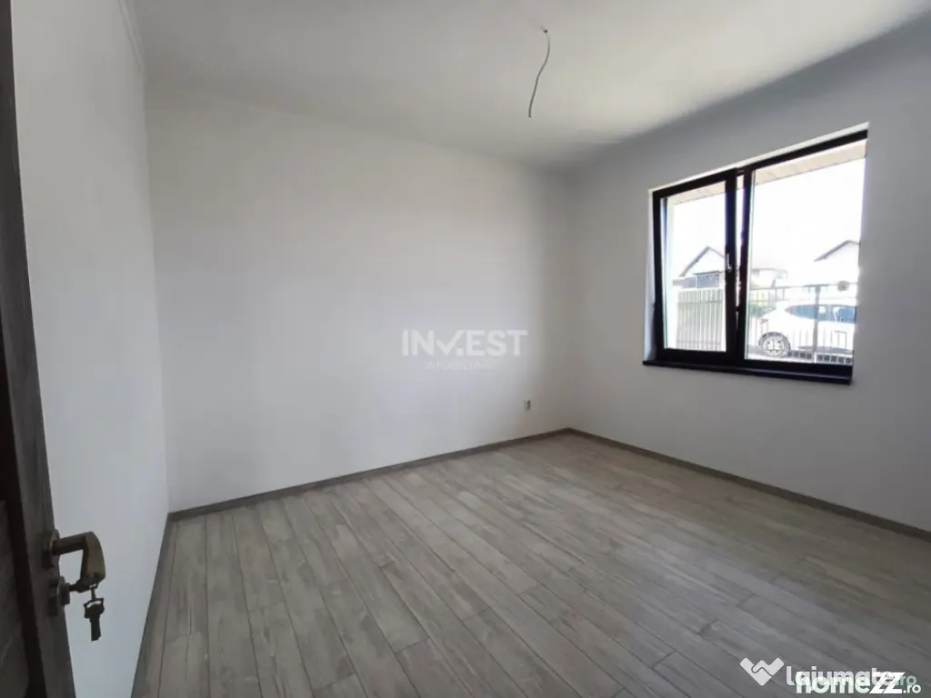 Casă cu 4 camere, 2 băi, beci spațios și 400 mp teren