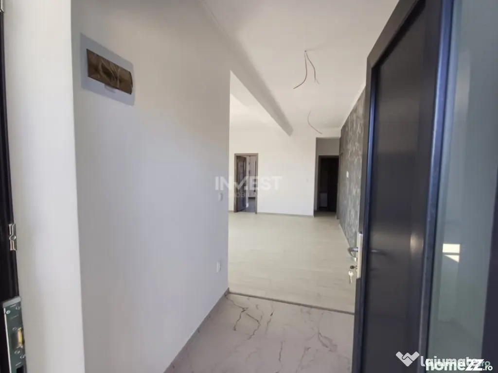 Casă cu 4 camere, 2 băi, beci spațios și 400 mp teren