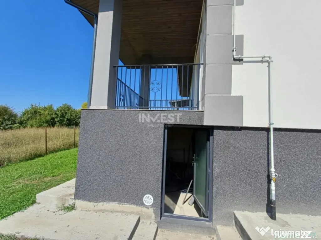 Casă cu 4 camere, 2 băi, beci spațios și 400 mp teren