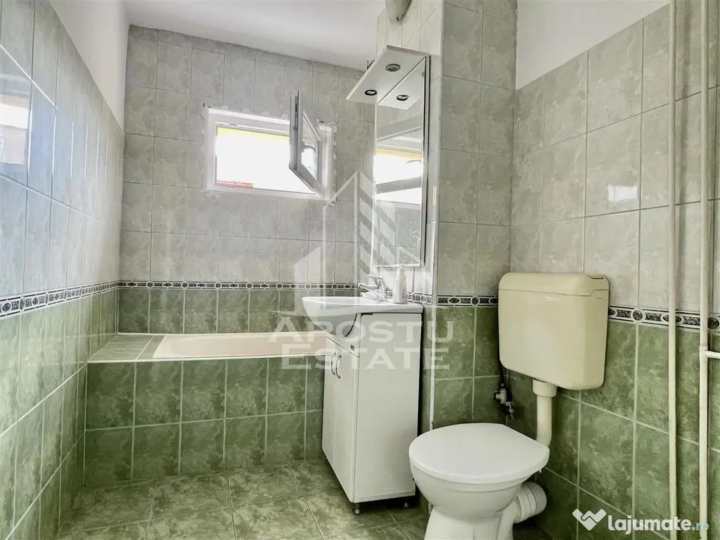 Apartament trei camere decomandat etaj intermediar 