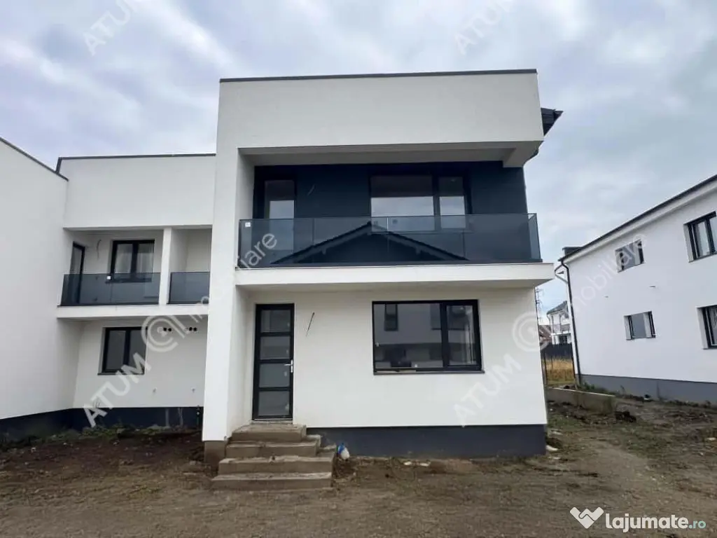 Casa cu 4 camere 2 bai curte de 50 mp zona Calea Cisnadiei S 