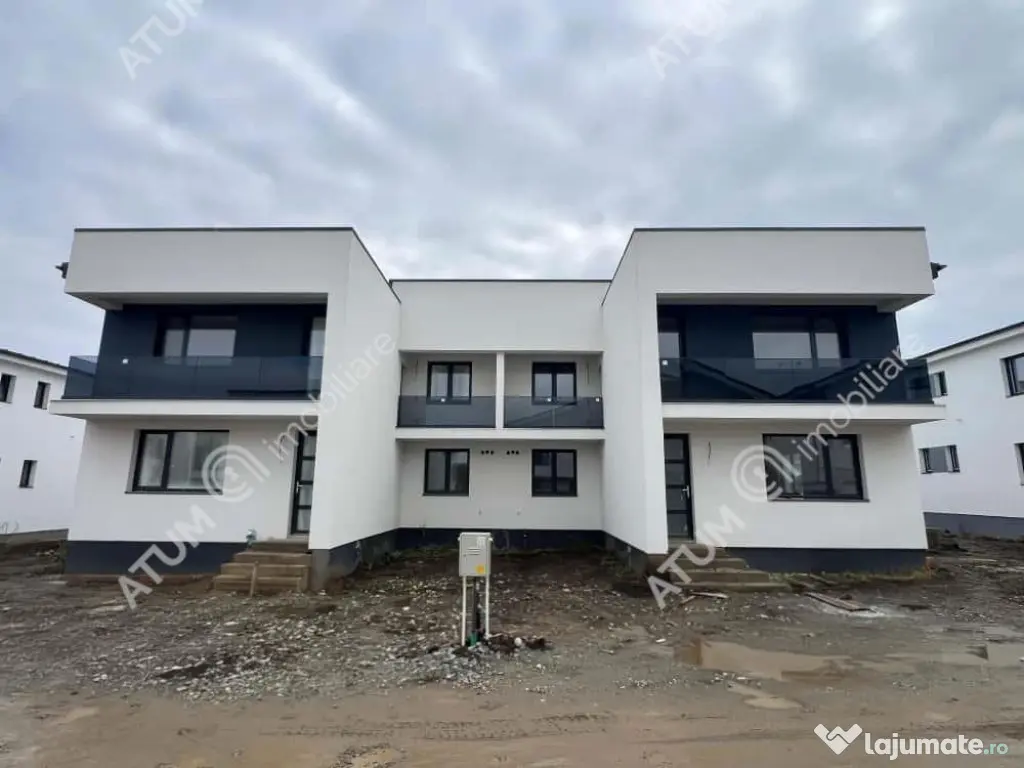 Casa cu 4 camere 2 bai curte de 50 mp zona Calea Cisnadiei S 