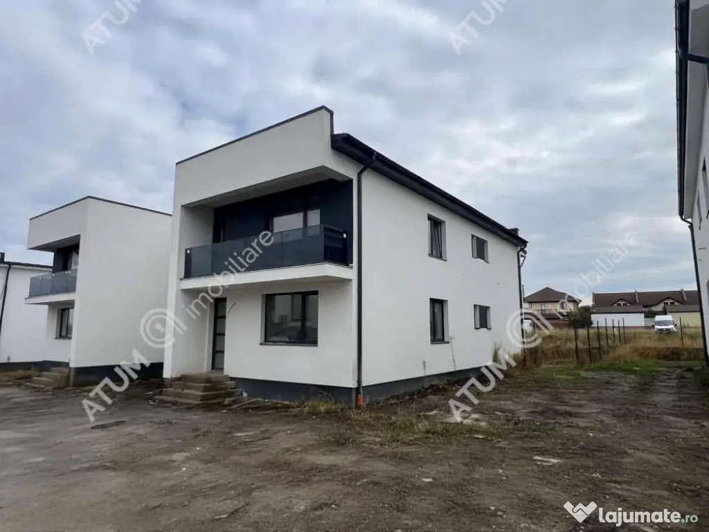 Casa cu 4 camere 2 bai curte de 50 mp zona Calea Cisnadiei S 