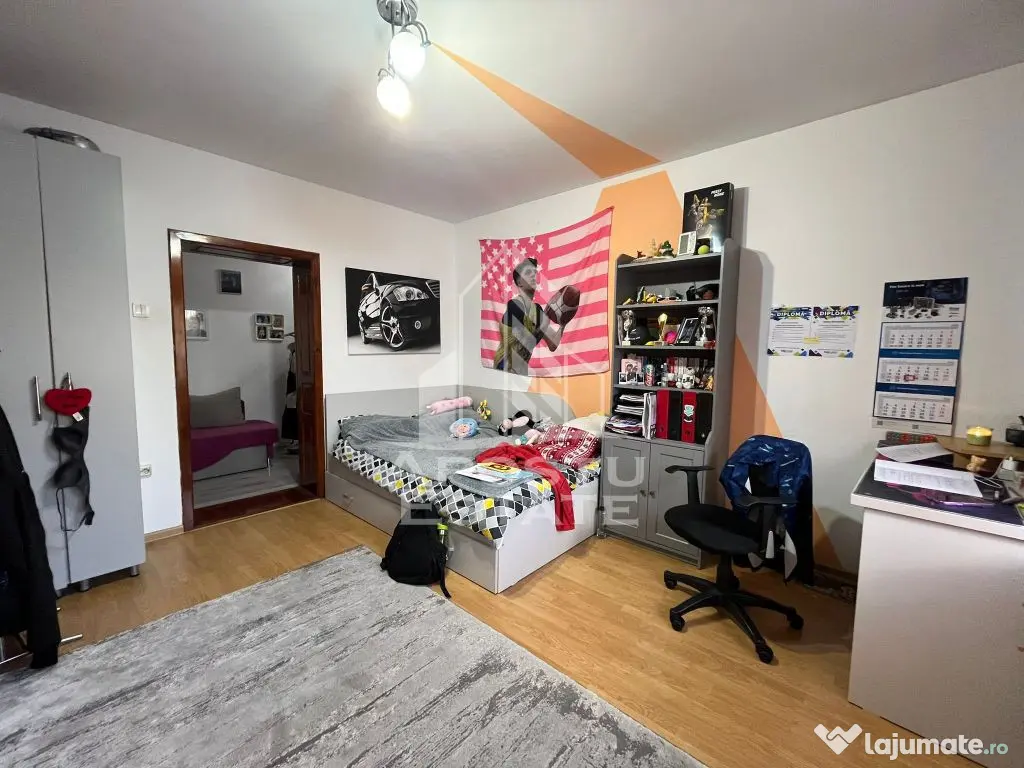 Casa individuala,3 camere, 2 bai, acces auto, garaj,teren...