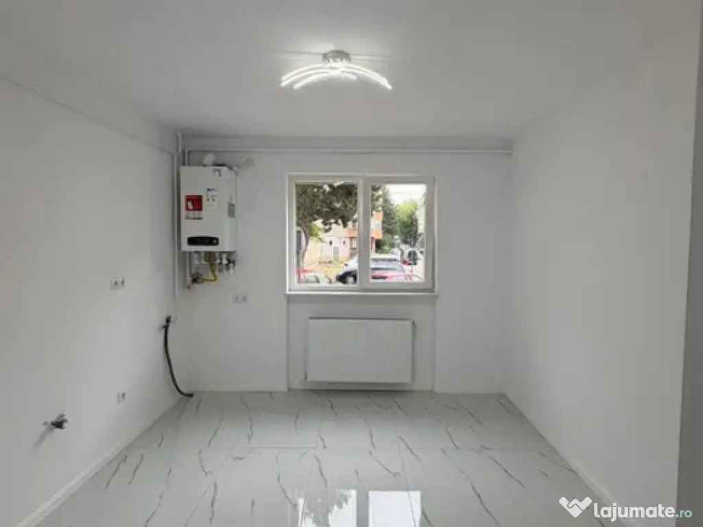 Apartament Cu 2 Camere Parter Inalt - Zona Burdujeni