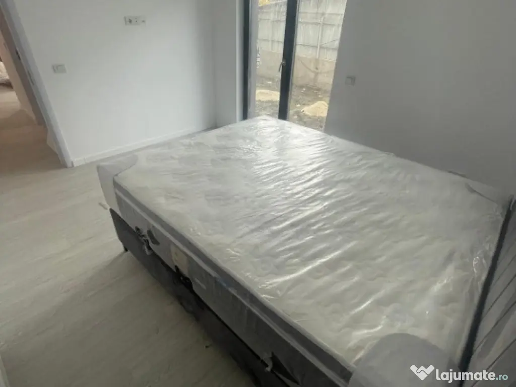 Apartament 2 camere cu curte proprie și 2 locuri de parcare