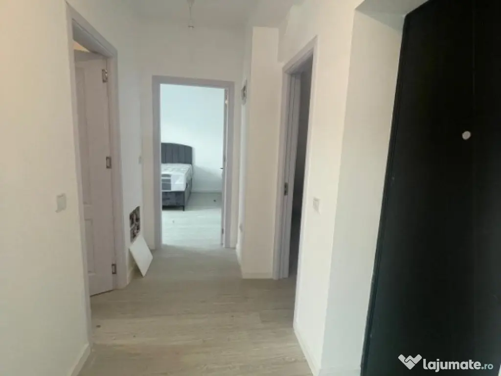 Apartament 2 camere cu curte proprie și 2 locuri de parcare