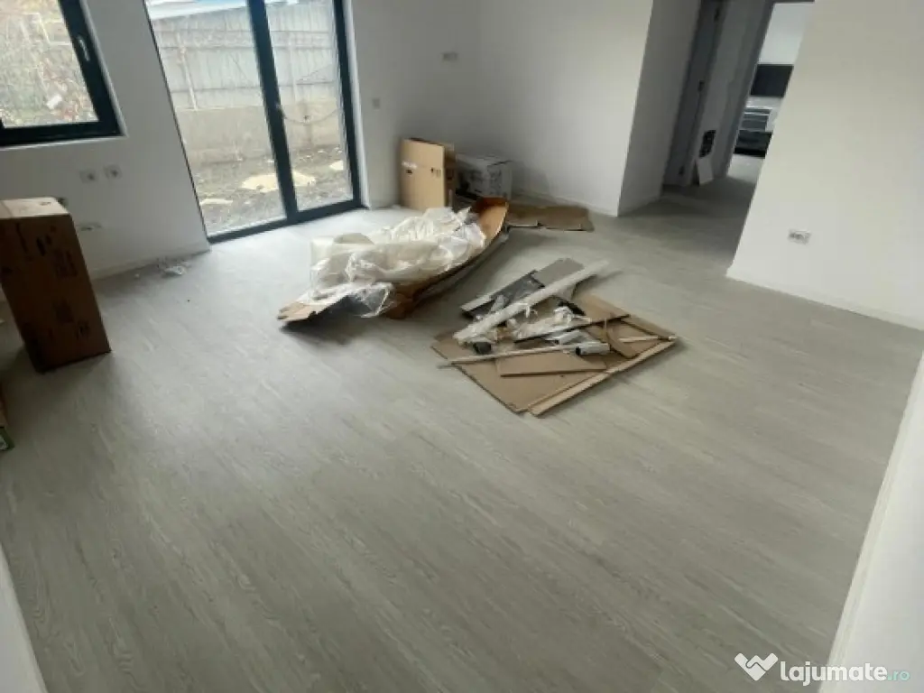 Apartament 2 camere cu curte proprie și 2 locuri de parcare