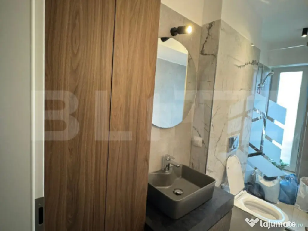 Apartament modern cu 3 camere, zonă premium –Tractorul