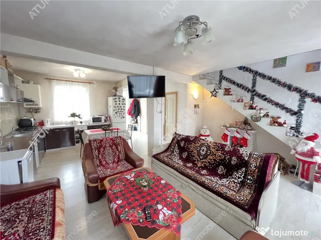 Casa 3 camere 2 bai terasa si curte zona Calea Cisnadiei din