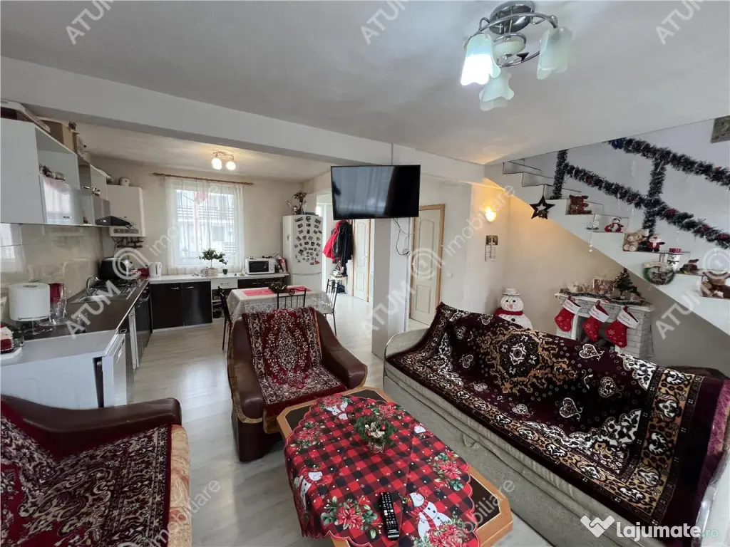 Casa 3 camere 2 bai terasa si curte zona Calea Cisnadiei din