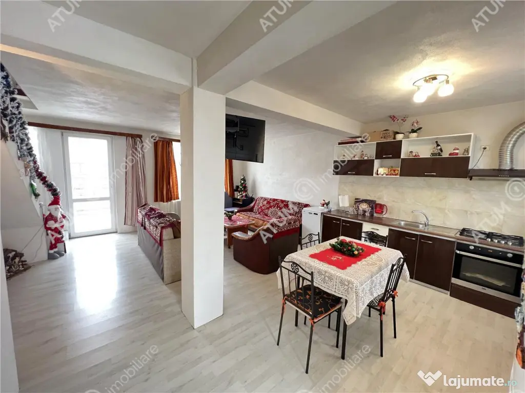 Casa 3 camere 2 bai terasa si curte zona Calea Cisnadiei din