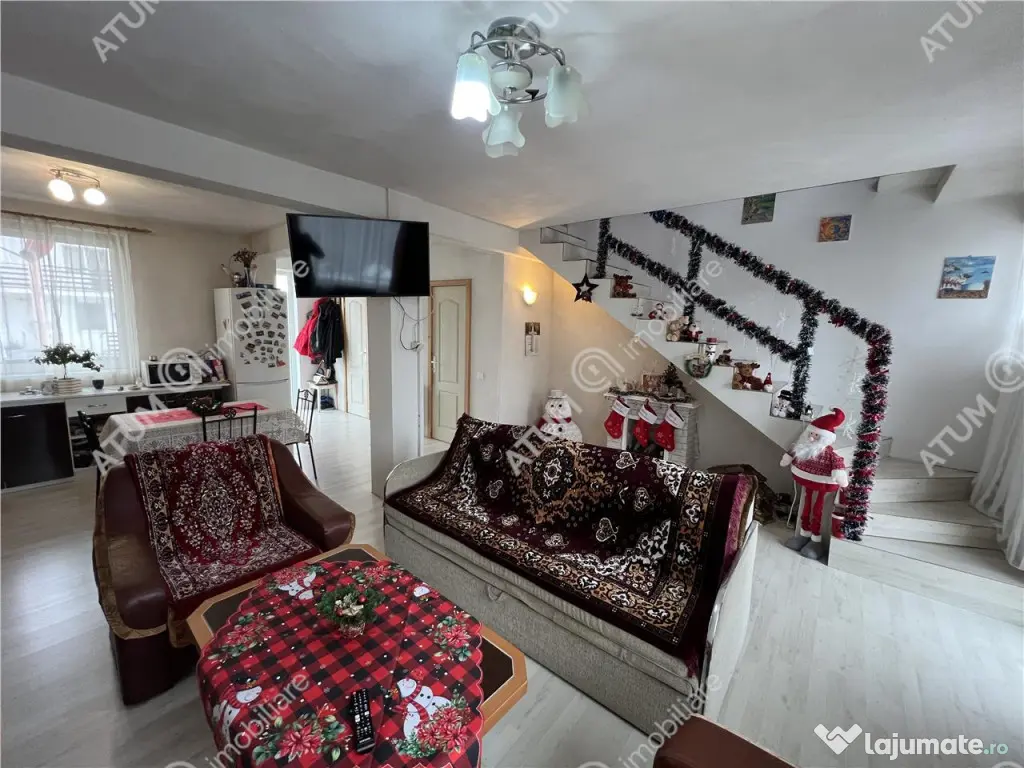 Casa 3 camere 2 bai terasa si curte zona Calea Cisnadiei din