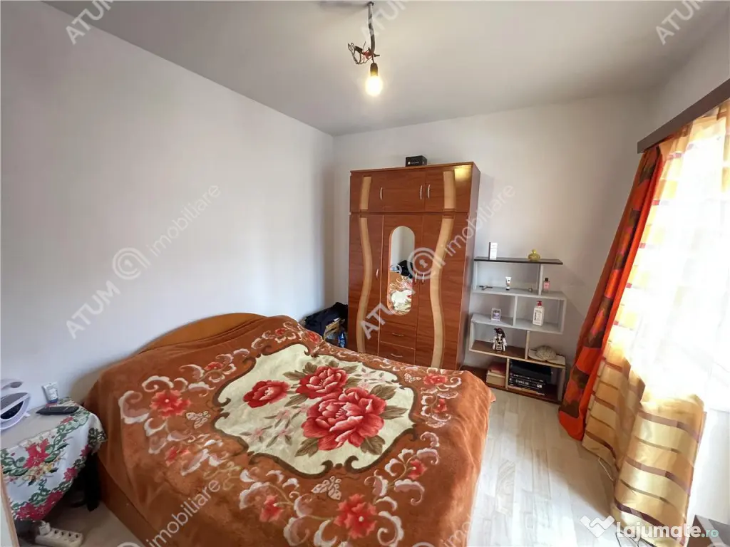 Casa 3 camere 2 bai terasa si curte zona Calea Cisnadiei din