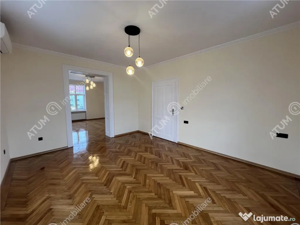 Spatiu de birouri complet renovat cu 3 camere si 2 bai zona 