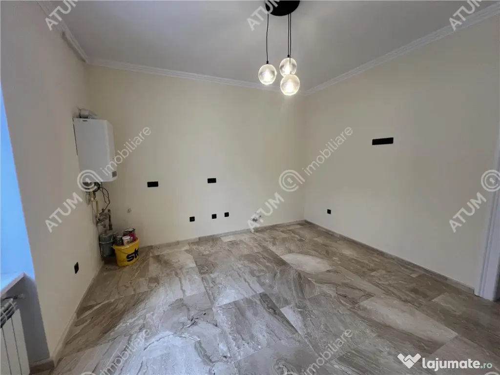 Spatiu de birouri complet renovat cu 3 camere si 2 bai zona 