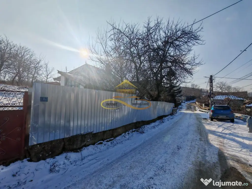 Teren 1.128 mp cu casă bătrânească – toate utilită... 