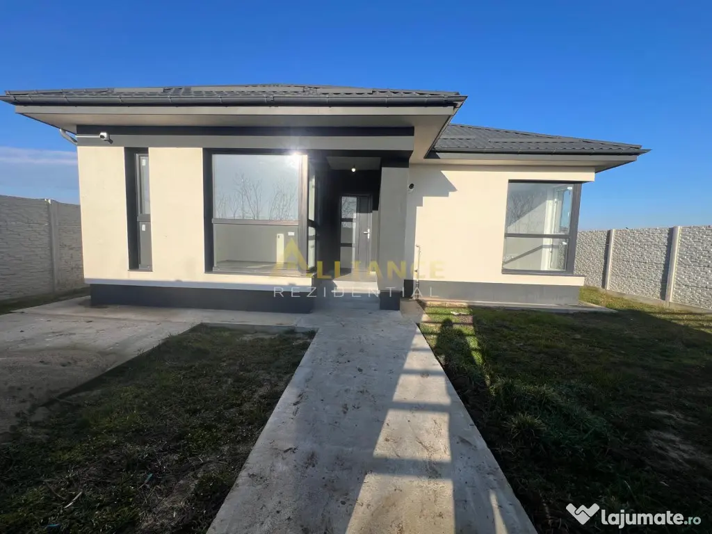 Casa de cu 3 camere,2 bai,teren 376mp 