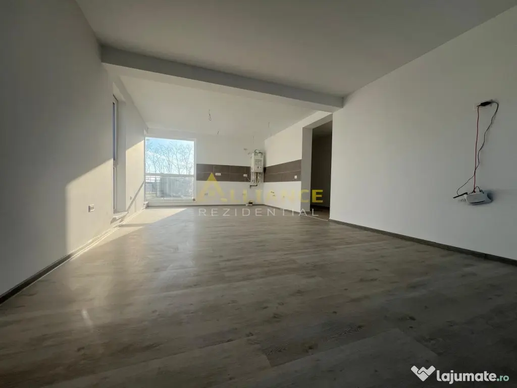 Casa de cu 3 camere,2 bai,teren 376mp 