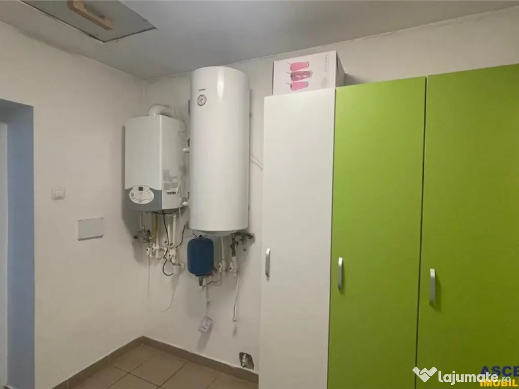 Spatiu multifunctional,locuri parcare in curte,gradina,facil