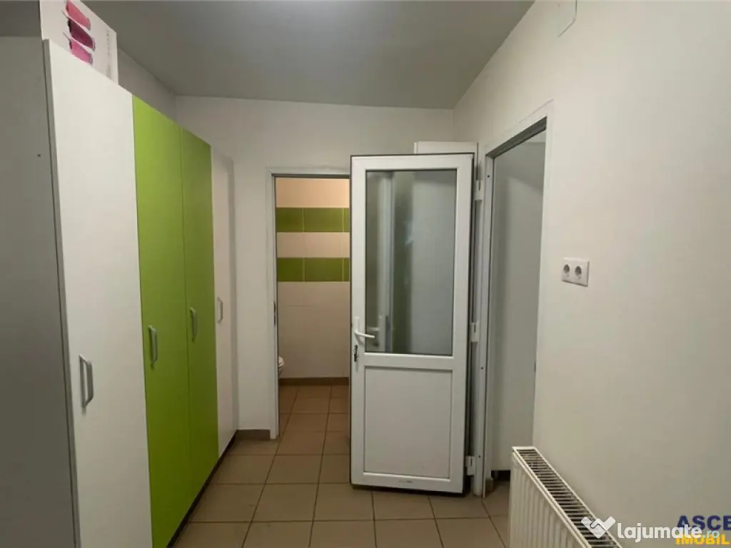 Spatiu multifunctional,locuri parcare in curte,gradina,facil 