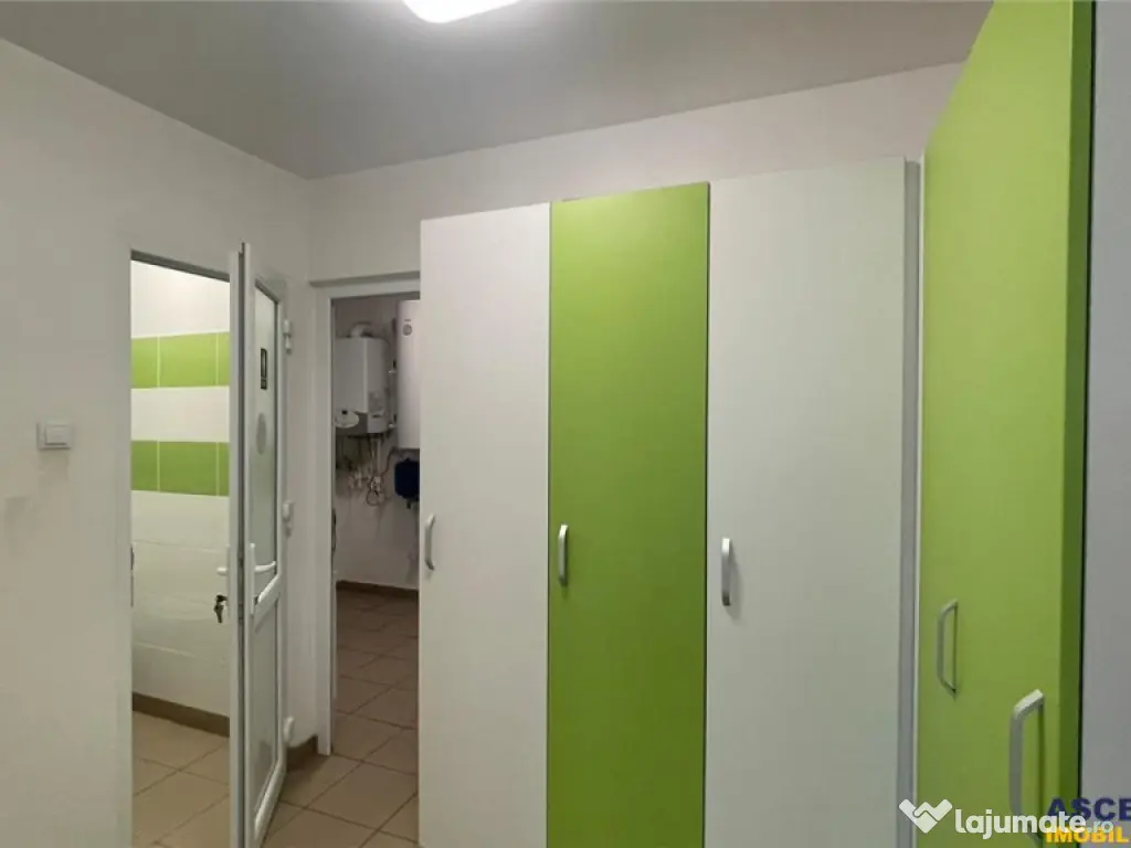 Spatiu multifunctional,locuri parcare in curte,gradina,facil 