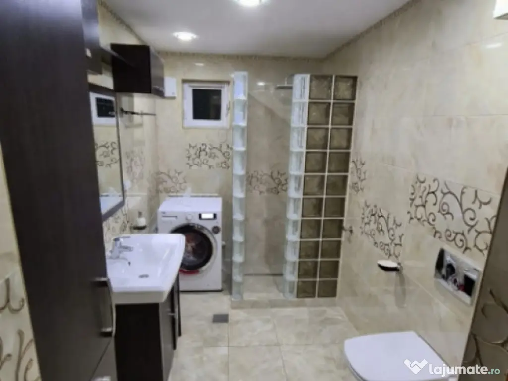 Casa individuala 96,50 mp utili, P+M - 175 mp teren - curte, 