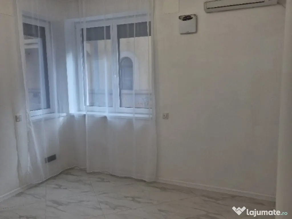 Inchiriere Duplex 5 camere ( Parter + Demisol ) in vila Piata Romana