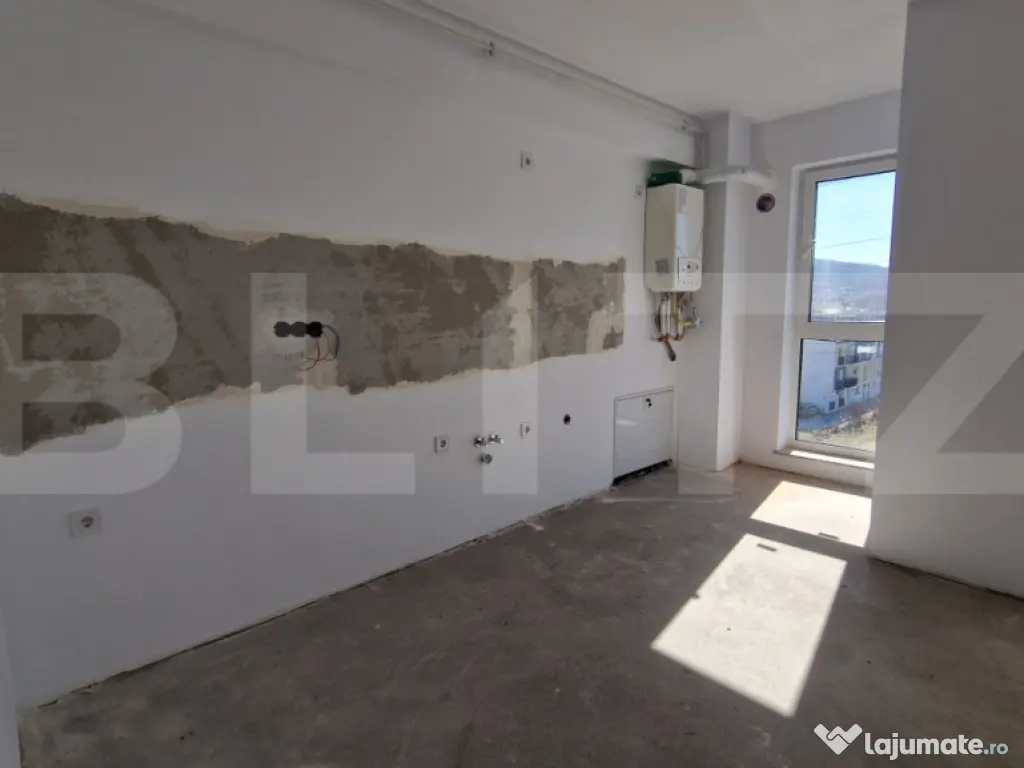 Apartament cu 2 camere, semifinisat, parcare subterana, zona