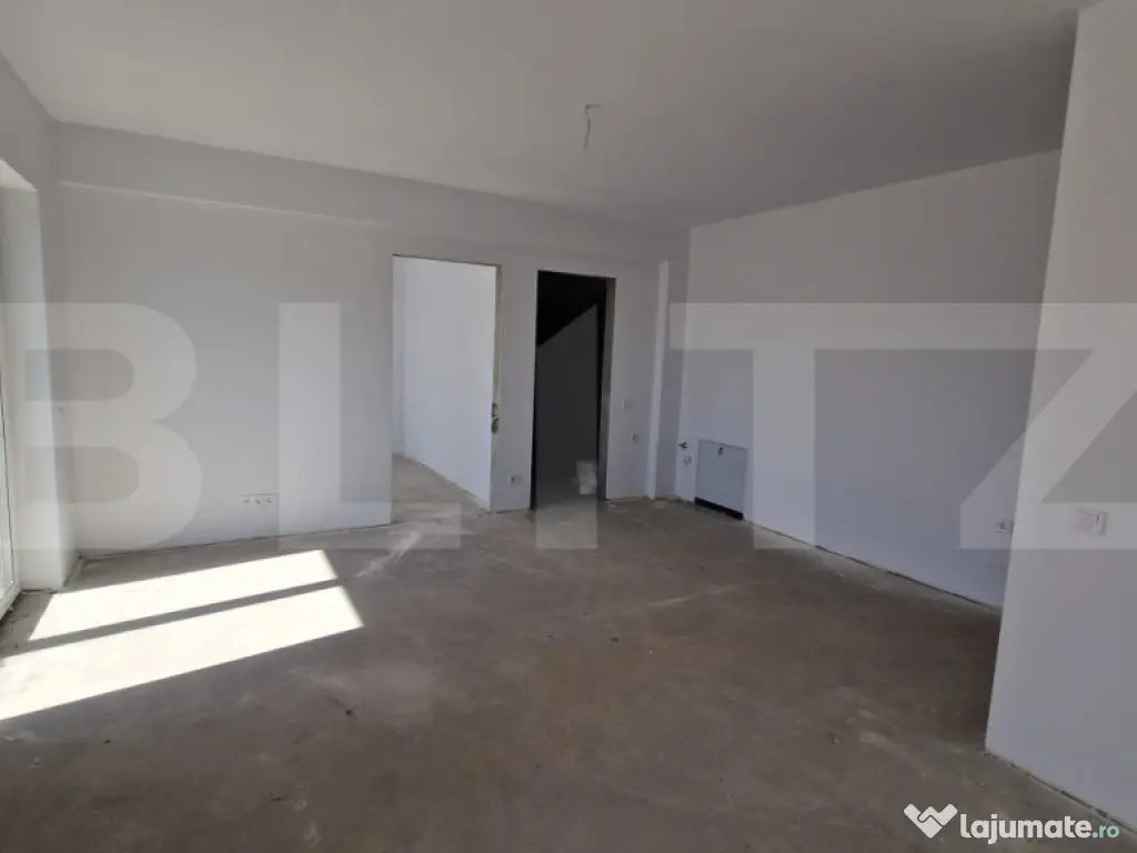 Apartament cu 2 camere, semifinisat, parcare subterana, zona