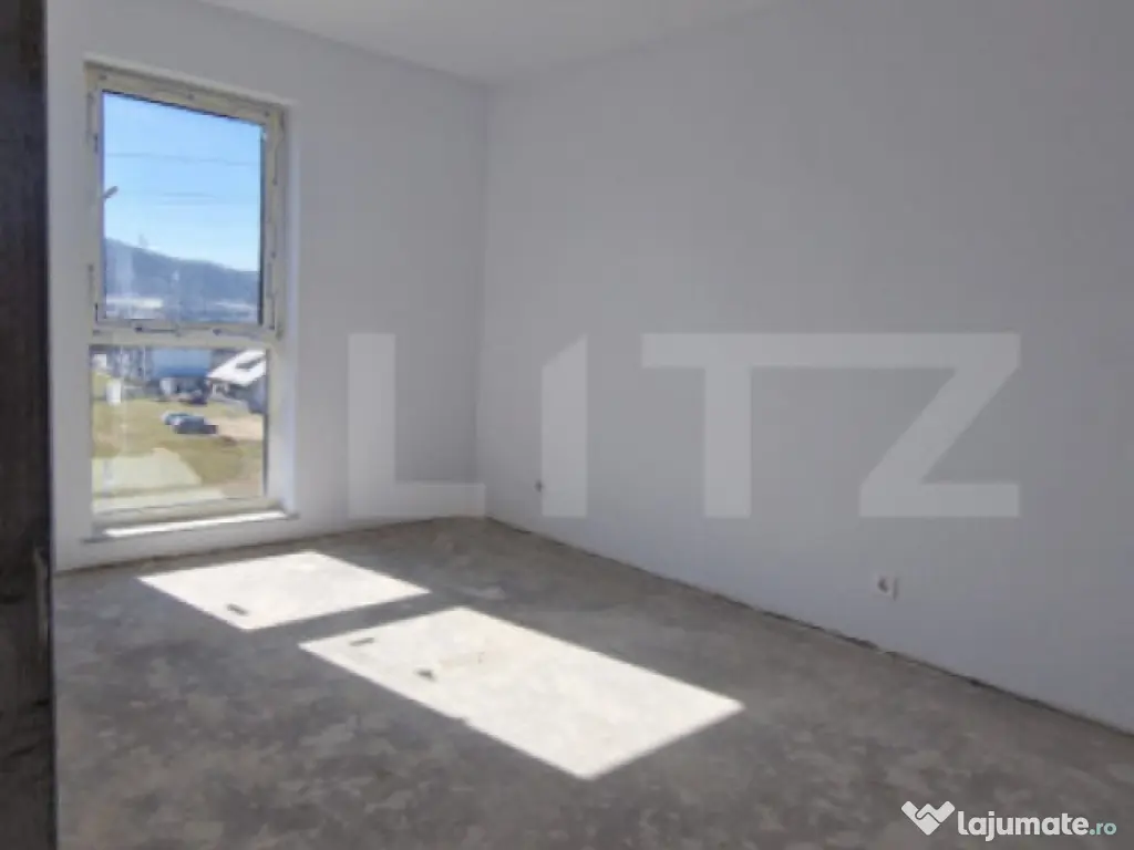 Apartament cu 2 camere, semifinisat, parcare subterana, zona