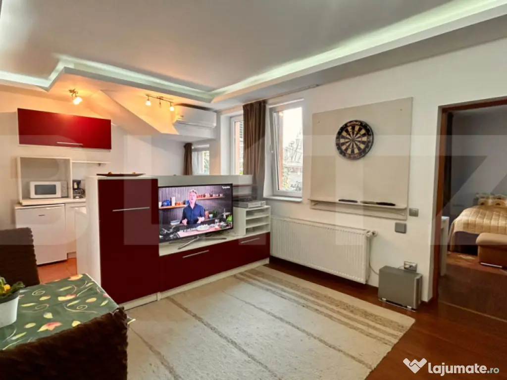 Apartament la casa , 50 mp , 2 camere , curte comună 