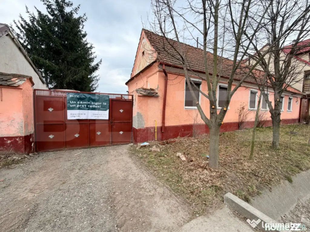 Casă veche cu teren generos – 1595 mp – zonă centrală 