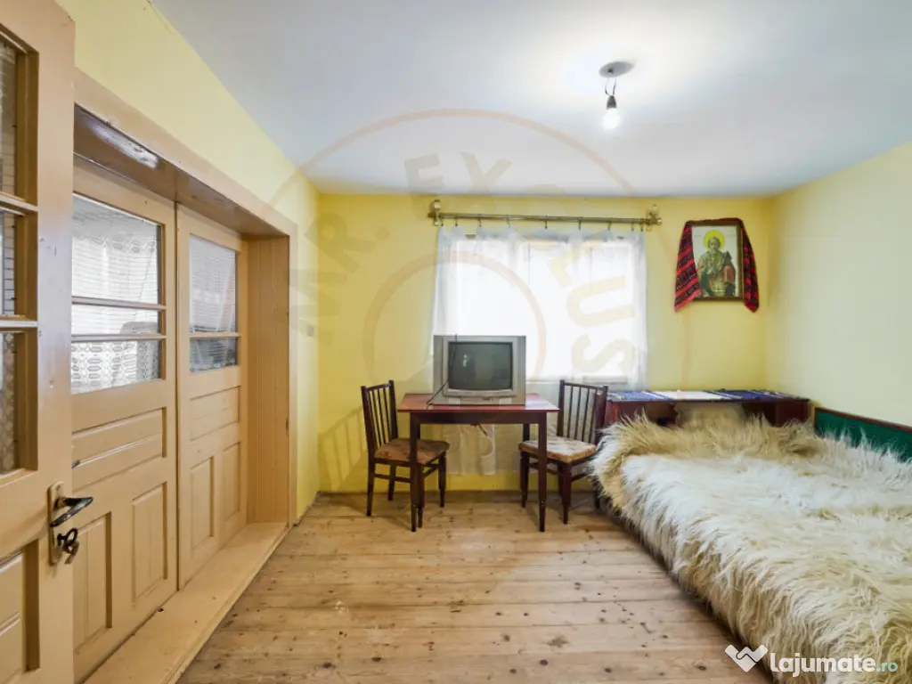 Casa la munte cu teren generos in Com. Nucsoara, loc. Slat 