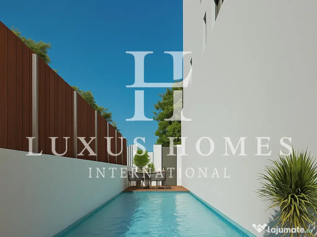 Apartament cu acces la plajă și piscină situată într-o zonă de coastă vibrantă 