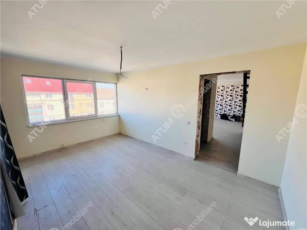 Apartament cu 3 camere 2 bai situat in zona Rahovei din Sibi 