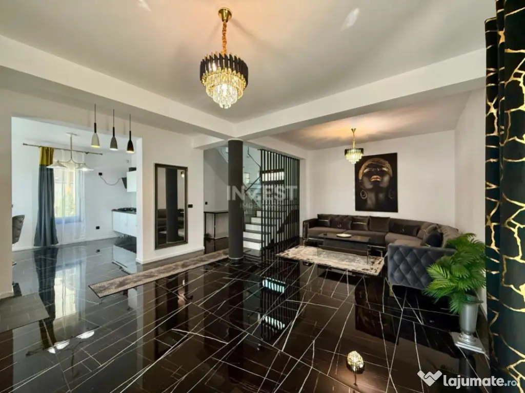 Vilă de vânzare cu design deosebit în cartierul Bucium 